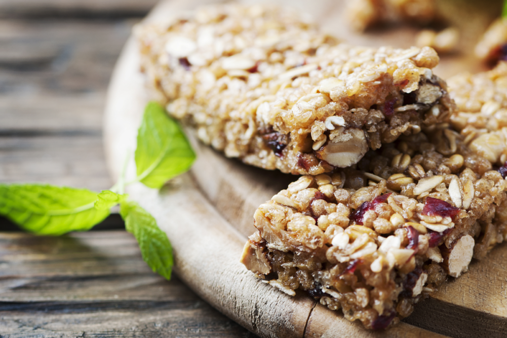 Granola bar on wooden background