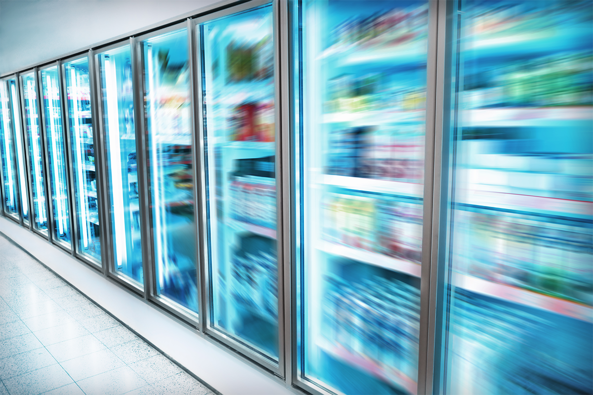 Frozen food aisle in grocery store