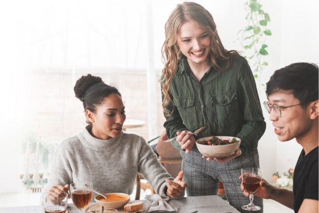 Friends sharing a sustainably sourced meal