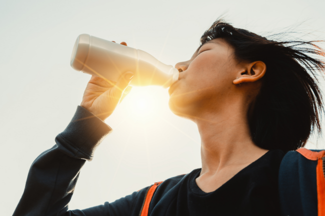 Man drinking high-protein beverage