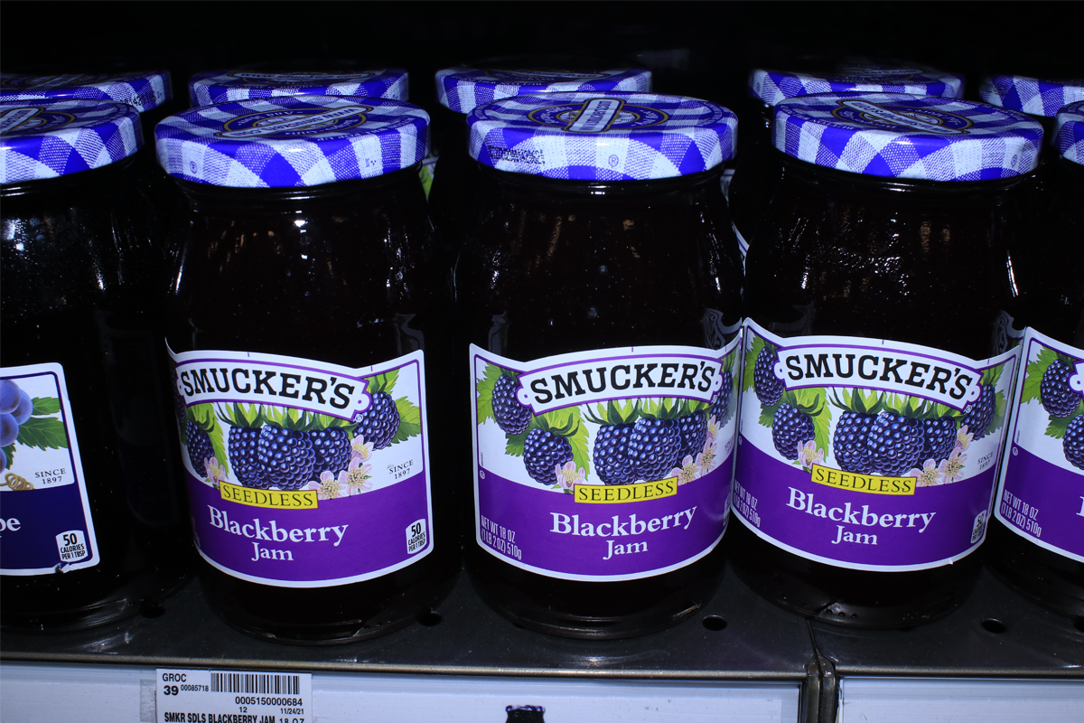 Smucker Blackberry Jam on a metal shelf