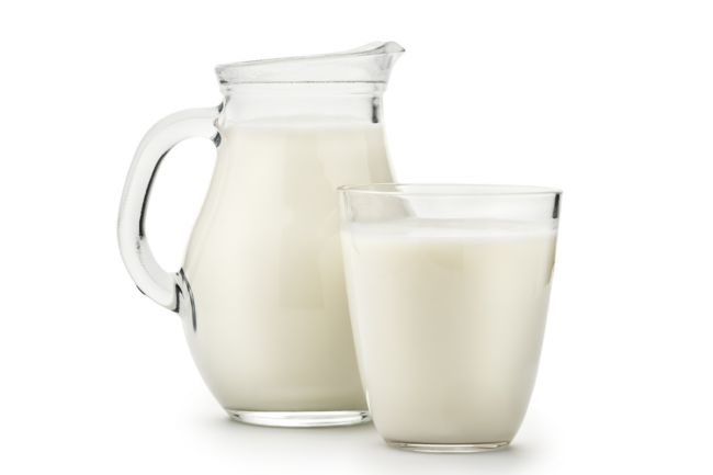 glass of milk on white background