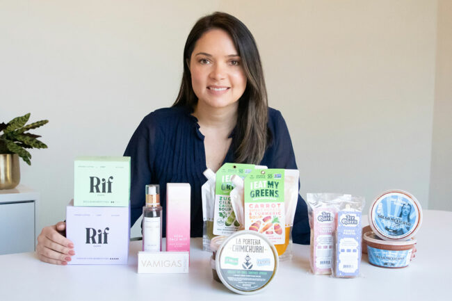 Junea Roche of Brazi Bites with accelerator participants' products