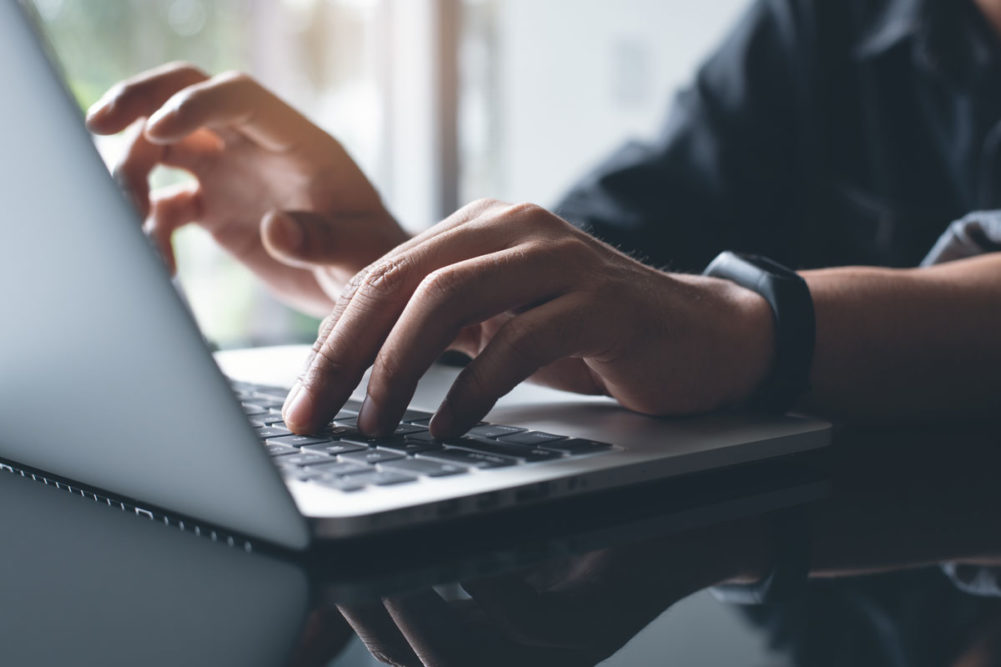 Person working on a laptop