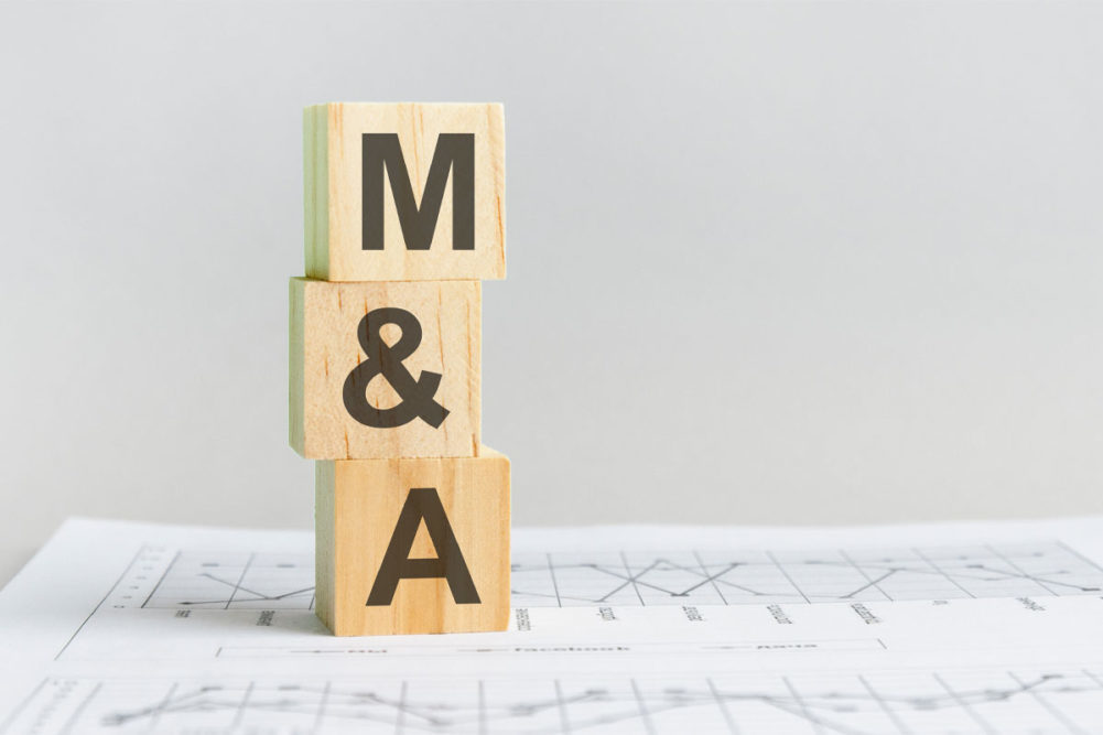 M&A on wooden blocks