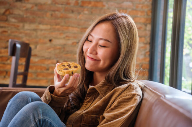 woman eating cookie